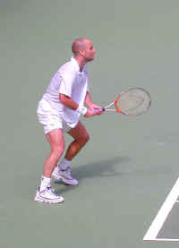 Agassi returns serve.JPG (119490 bytes)